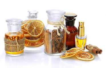 Bottles with ingredients for the perfume, isolated on white
