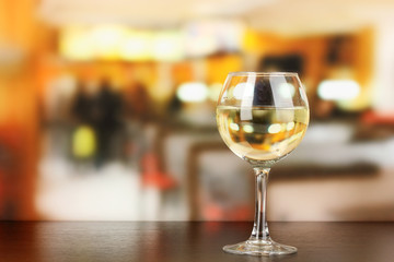 Pour something into glass with drink