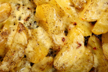 Roasted potatoes with spices and cheese