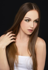 Obraz premium Portrait of beautiful woman with long hair