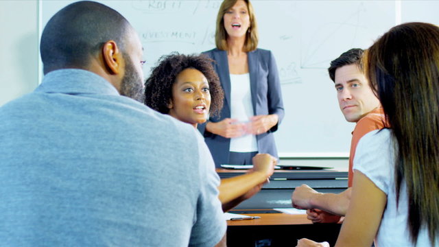 Female Tutor Multi Ethnic Adult Students