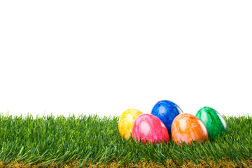 Fototapeta na wymiar Wielkanoc - kolorowe jaja w trawie