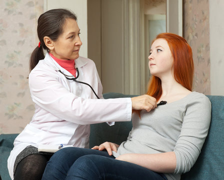doctor listening the patient with stethoscope
