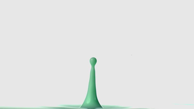 Drop of green paint falling on paint