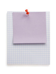 pushpin and note paper on white
