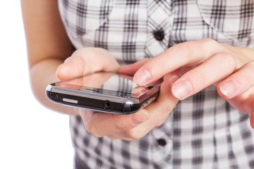 A woman uses a mobile phone