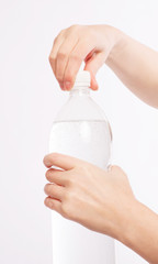 Water bottle in the hands - 50207861
