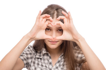 Woman and heart shaped fingers