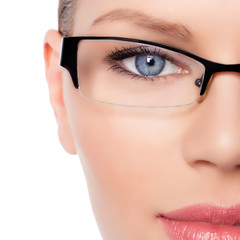 Attractive Young Optician Woman With Blue Eyes  In Glasses