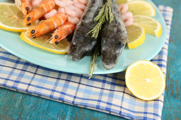 Fresh fishes with shrimp and lemon