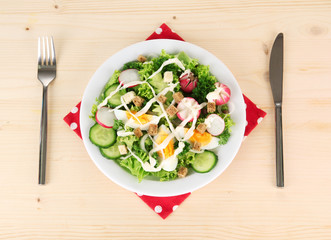 Fresh mixed salad with eggs, salad leaves and other vegetables,
