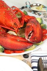 Red lobster on platter on serving table close-up