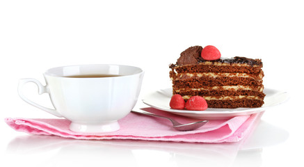 A cup of tea and delicious cake isolated on white