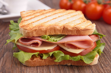 sandwich on wood background