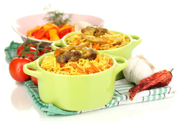 Delicious pilaf with vegetables isolated on white