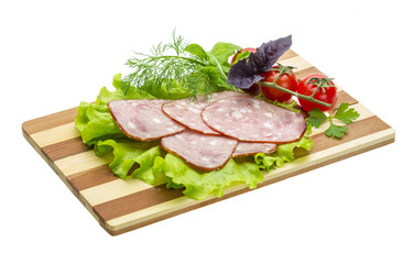 Sausages with salad and basil