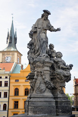 Fototapeta na wymiar Prague Charles bridge Saint Ivo statue by M.B. Braun, 1711