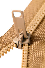 Brown zip with metal teeth © Arūnas Gabalis