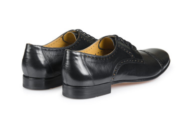 Fashion concept with male shoes on white