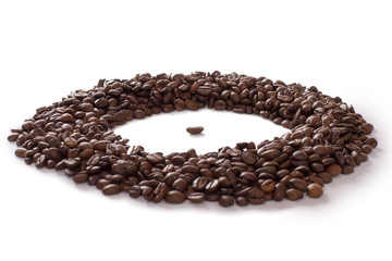coffee bean surrounded by other coffee beans