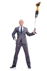 Businessman doing vacuum cleaning on white