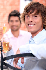 Men drinking champagne