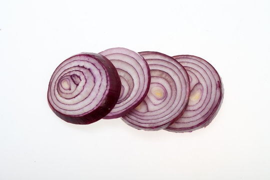 sliced onion isolated on white