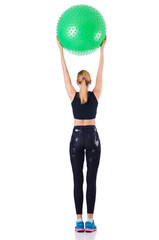 Young girl with swiss ball doing exercise