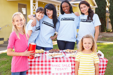 Women And Children Running Charity Bake Sale