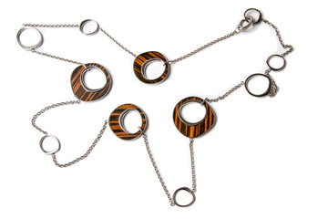 Metal and Wood Necklace Isolated on White.