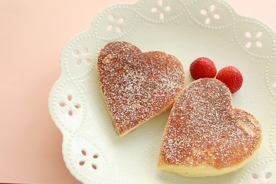 Heart shaped pancake with strawberry 