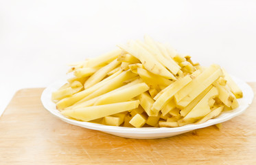 Fresh Potatoes with cut isolated on white