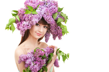 Young woman with flowers on white background