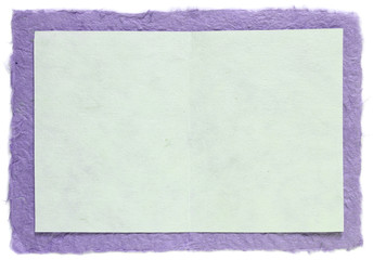 handmade paper with blank note isolated on white