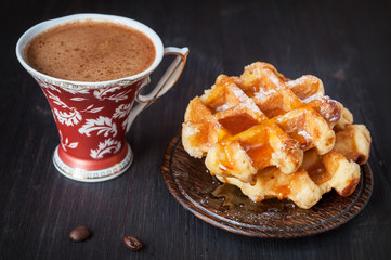 Sweet waffles with honey and coffee