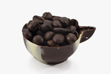 Coffee beans in a chocolate cup