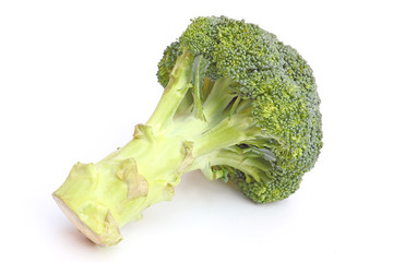 Whole broccoli head isolated on white