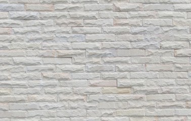 White brick wall in the background