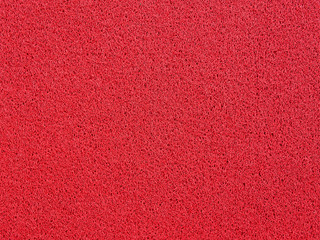 Background of red carpet or foot scraper