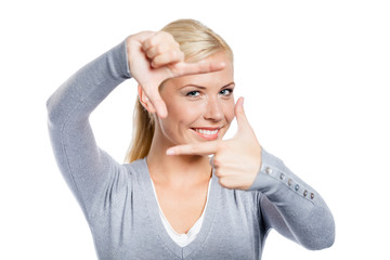 Woman making frame gesture with hands, isolated on white