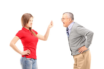 Angry father shouting at his daughter
