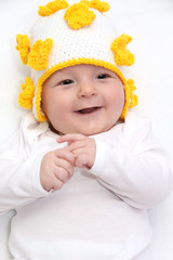 Beautiful baby in knitted hat