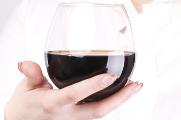 Girl holds a glass in his hand