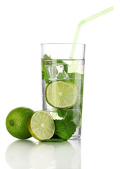Glass of water with ice, mint and lime isolated on white