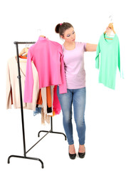 Young girl buying clothes isolated on white