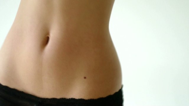 HD1080p Slim young sexy woman moving her belly