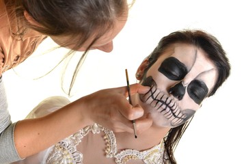 Creative face paint portrait .Day of the Dead persons