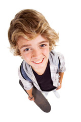 overhead view of cute teen boy on white background