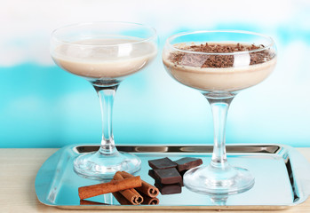 Cream cocktails on brightblue background