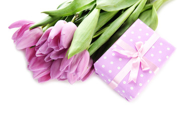 Beautiful bouquet of purple tulips and gift box, isolated